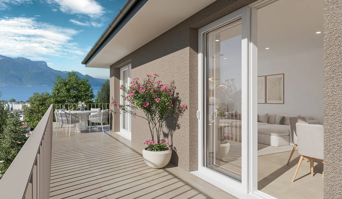 Le balcon filant d'un appartement de Terralys, le lac et les Alpes au fond