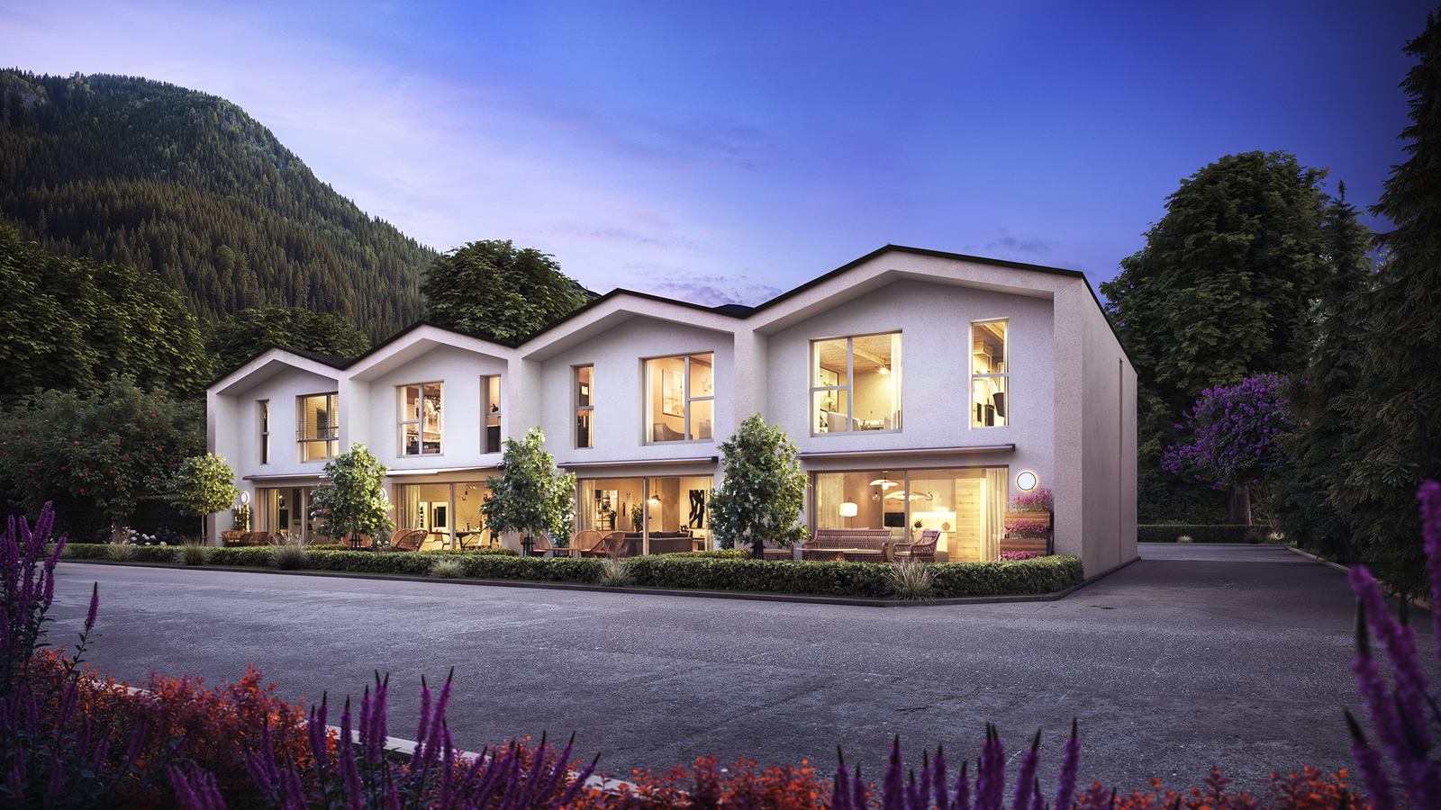 Les villas de Martigny à la nuit tombante, intérieurs éclairés